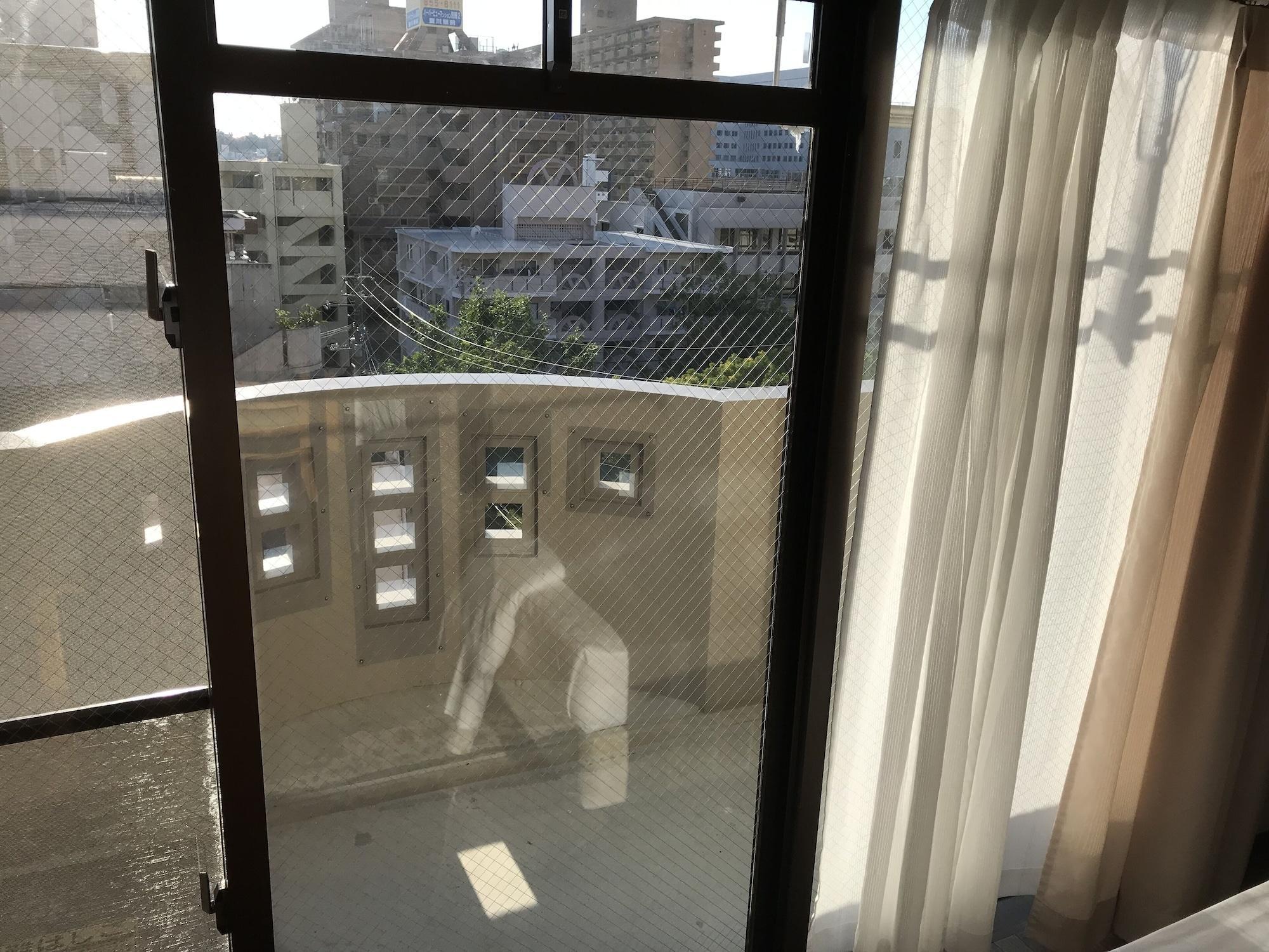 Appartamento Weekly Harbourview Mansion Main Building Naha Esterno foto